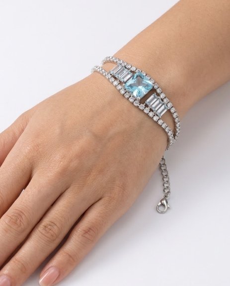 Premium quality crystal with radiant shine Elegant double-layer design for a trendy look Eye-catching blue centerpiece stone Adjustable chain for perfect fit Lightweight and comfortable to wear Suitable for casual and formal occasions Perfect gift choice for girls & women
