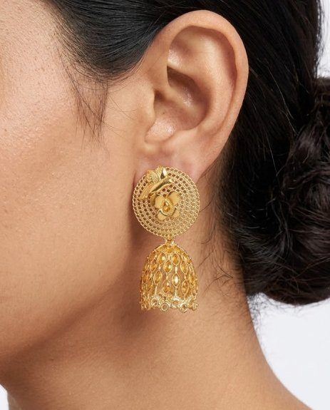 Premium Gold Finish: Luxurious shine that enhances your overall look Intricate Floral Design: Finely crafted floral patterns for a graceful appeal Dome-Shaped Jhumka: Classic and eye-catching traditional silhouette Lightweight & Comfortable: Designed for all-day wear without discomfort Versatile Wear: Perfect for weddings, parties, and festive occasions Why You Should Purchase: Elevates your outfit with a royal and elegant touch A perfect blend of traditional and modern design Ideal for special occasions and daily wear styling Great gifting option for loved ones Offers a luxurious look at an affordable price