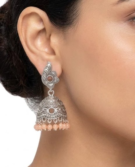 Elegant antique silver finish with detailed craftsmanship Soft peach bead droplets for a delicate, feminine look Lightweight and comfortable for long wear Perfect for weddings, parties, and festive events Ideal gift choice for girls and women Secure and easy-to-wear hook or stud closure